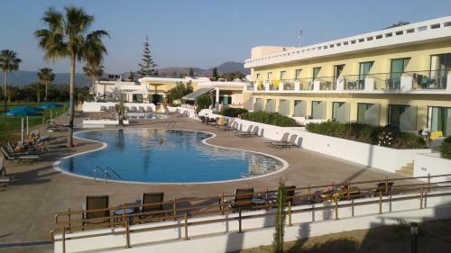 Natura Beach Hotel And Villas