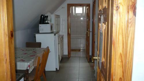 Hostal Ak�cvir�g Vend�gh�z �s Apartman