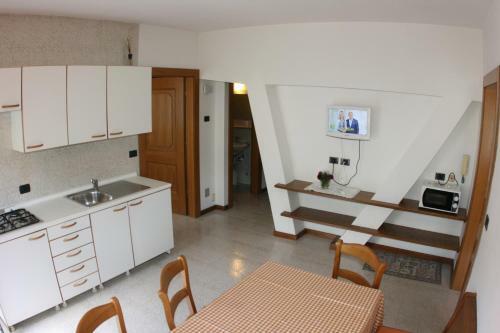 A. Paolo Apartments