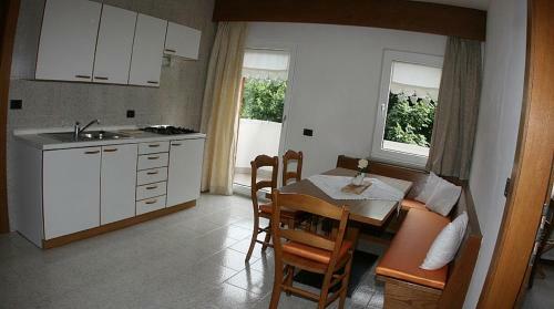 A. Paolo Apartments