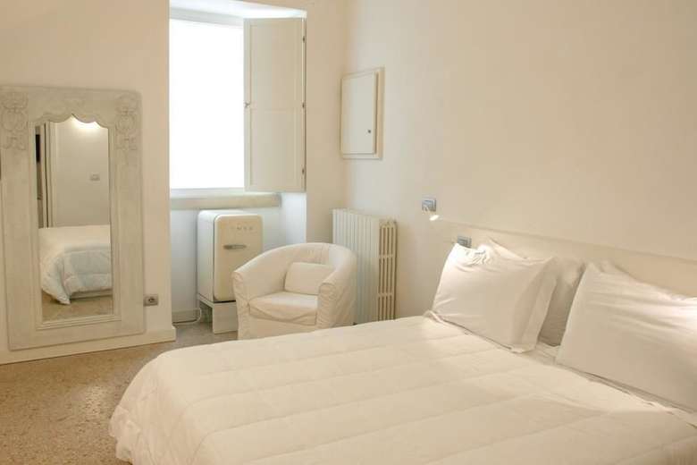 Hostal Sui Tetti Luxury Rooms