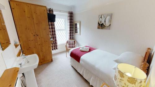 Hostal The Tudor Guest House
