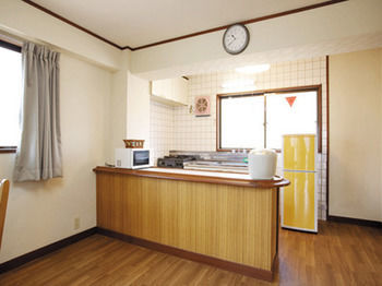 Apartamento Garland Court Usami