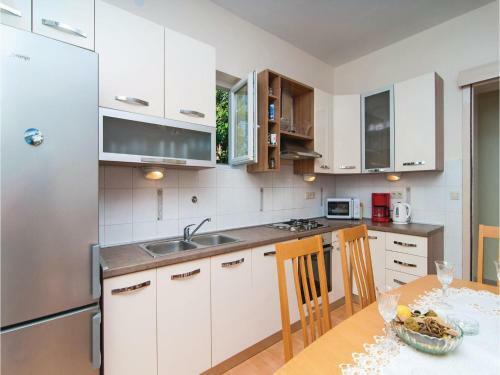 Three-bedroom Apartment With Sea View In Kastel Gomilica