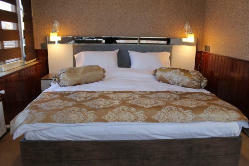 Albergue East House Hotel