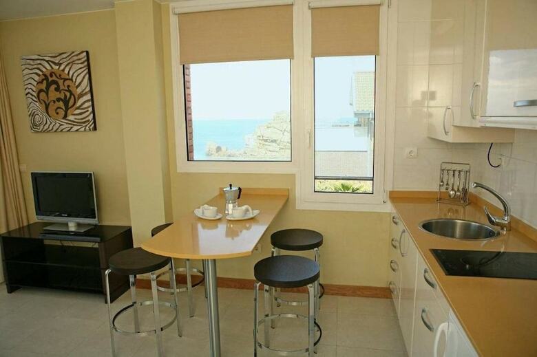 Apartamentos Playa De Portio