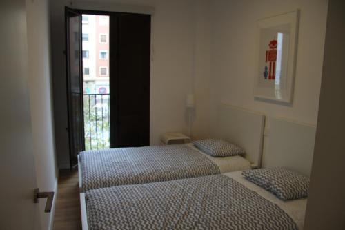 Apartamentos Hiedra Y Tapiner�a Mercado Central