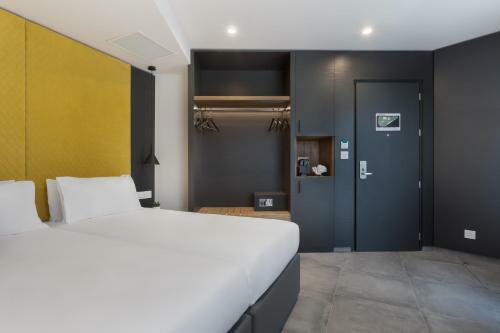 Hostal 115 The Strand Hotel And Suites