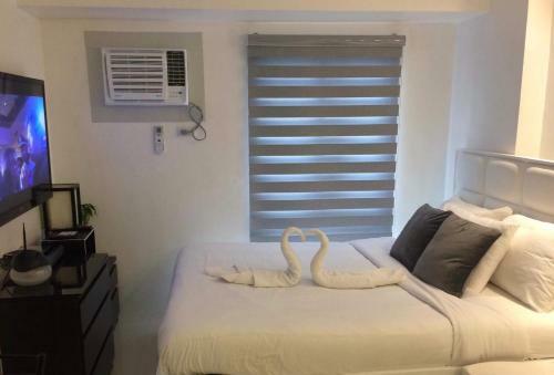 Apartamentos Avida Condo Near Naia