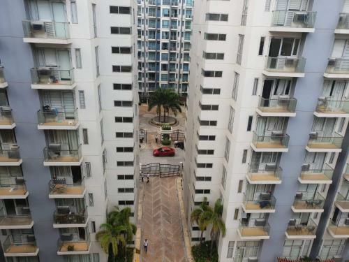 Apartamentos Condo Palm Tree