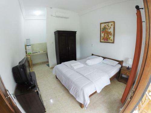 Hostal Uluwatu Made Guesthouse