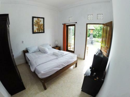 Hostal Uluwatu Made Guesthouse