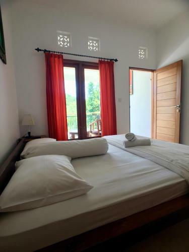 Hostal Uluwatu Made Guesthouse