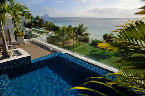 Apartamento Cap Ouest Beachfront Luxury Penthouse