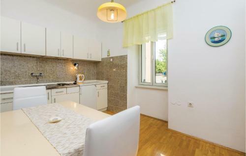 Apartment Omisalj Kacini III