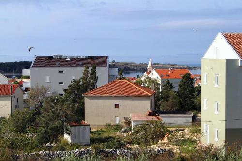 Apartment Novalja 9335b