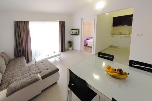 Holiday Apartments & Rooms