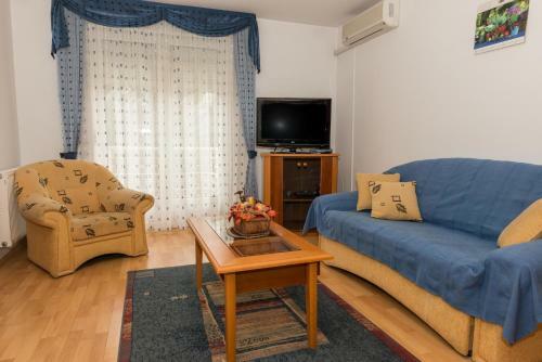 Musk�tli Apartmanh�z