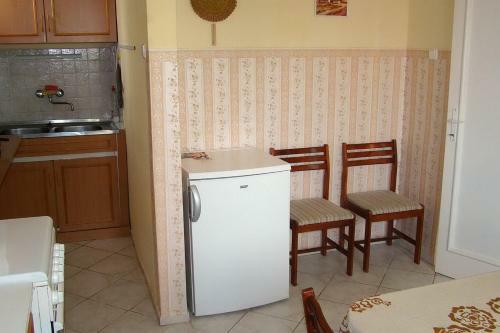 Napf�ny Apartmanh�z