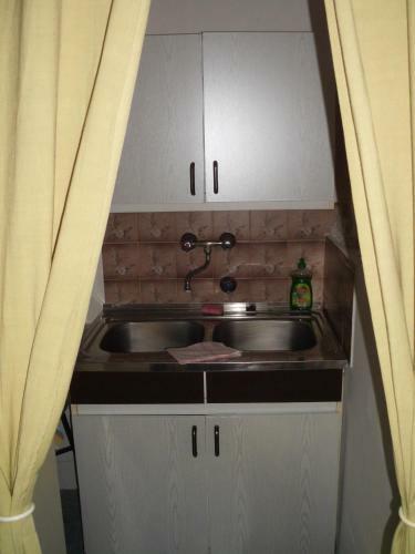 Kis Apartmanh�z