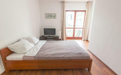 Apartamenty Salon - R�?a Wiatr�w