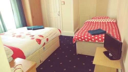 Hostal The Woodley Hotel