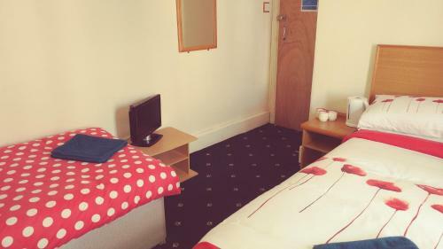 Hostal The Woodley Hotel