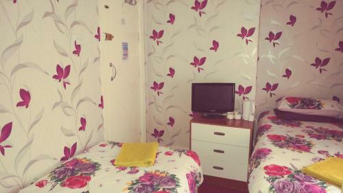 Hostal The Woodley Hotel