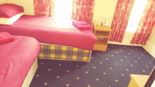 Hostal The Woodley Hotel