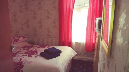 Hostal The Woodley Hotel