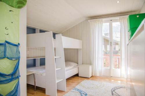 Chalet Delphin 6.5 - Griwarent Ag