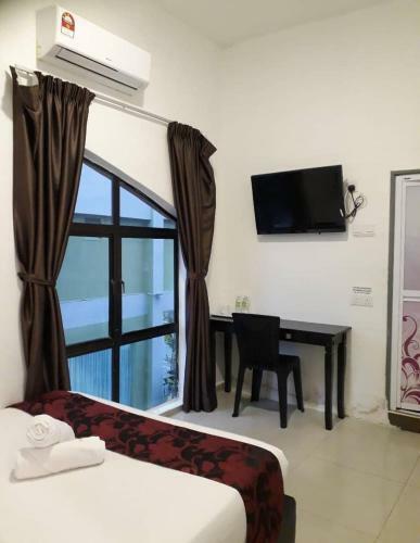Hostal Max Ferringhi Hotel