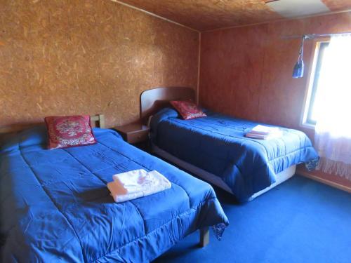 Hostal Y Caba�as Perla Del Lago