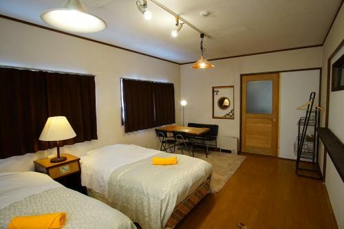 Hostal Hakuba Station Guesthouse En