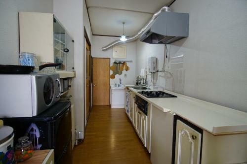 Hostal Hakuba Station Guesthouse En