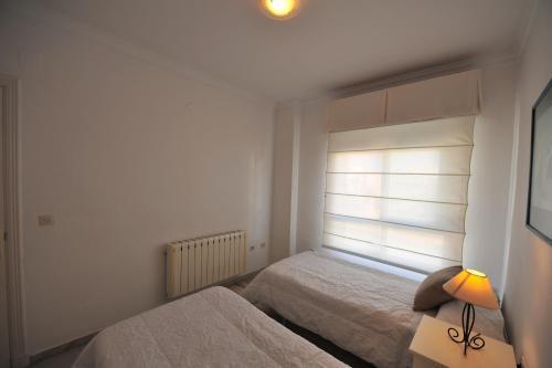 Apartamento Frente Playa Victoria Puesta Sol