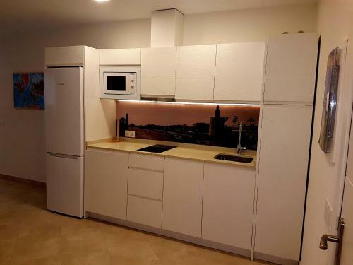 Reservaloen Apartamentos Murillo