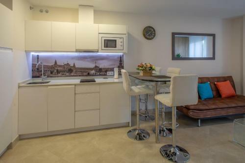 Reservaloen Apartamentos Murillo