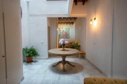 Reservaloen Casa Sevillana