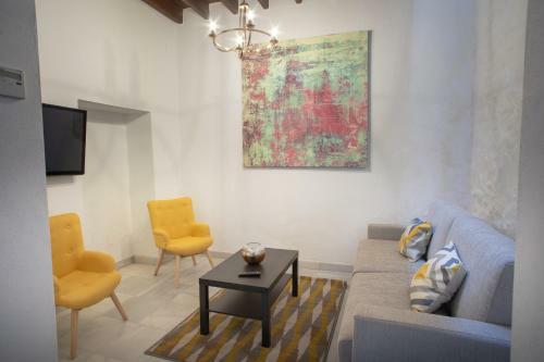 Reservaloen Casa Sevillana