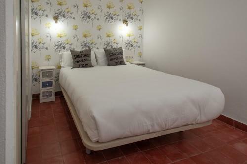 Reservaloen Casa Sevillana