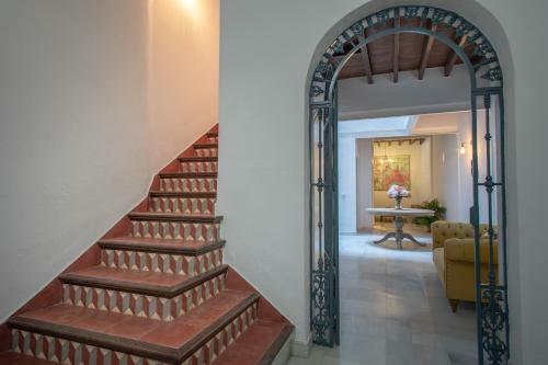 Reservaloen Casa Sevillana