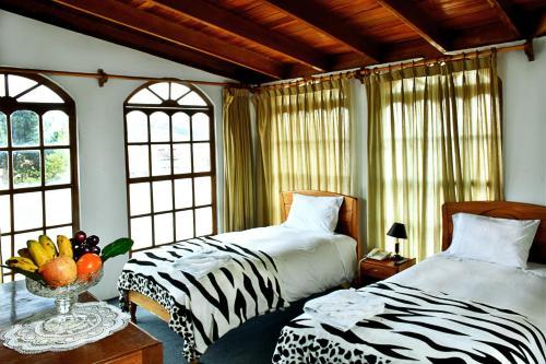 Hotel Centenario Inn