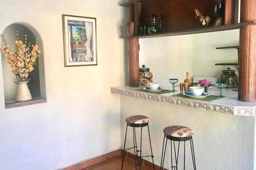 Hostal Casitas El Escondite Playa La Ropa