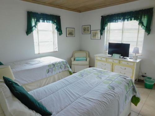 Apartamento The Grove Beach Condominiums