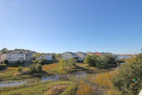 Apartamento 91 Waters Edge Folly Charm