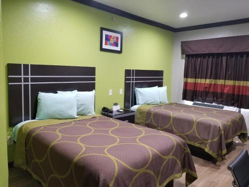 Hotel Woodland Inn Iah