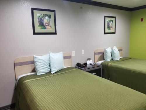 Hotel Woodland Inn Iah