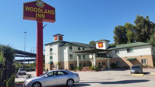 Hotel Woodland Inn Iah