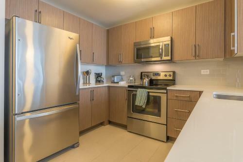 Apartamento Skyline Luxury Home Suites At Newport II